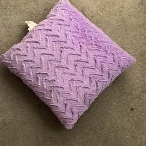 Light purple pillow that’s great for household furniture
